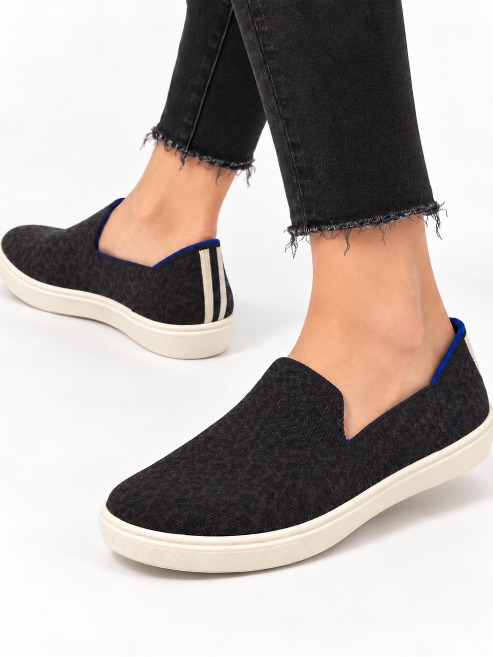 Rothy's Black Slip-On Leopard Print Sneakers with Blue Trim